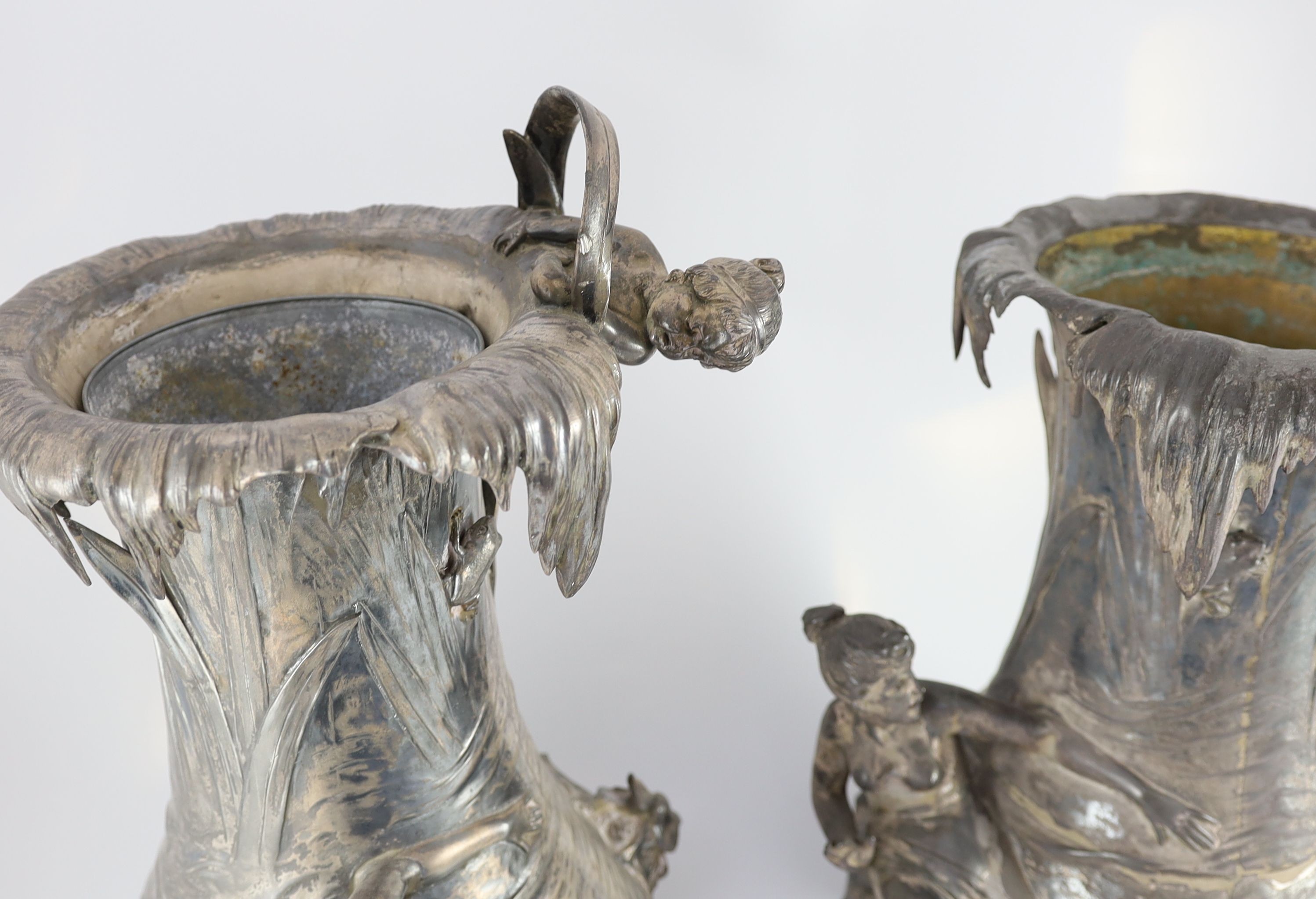 A pair of very large WMF Art Nouveau silvered pewter vases, height 61cm